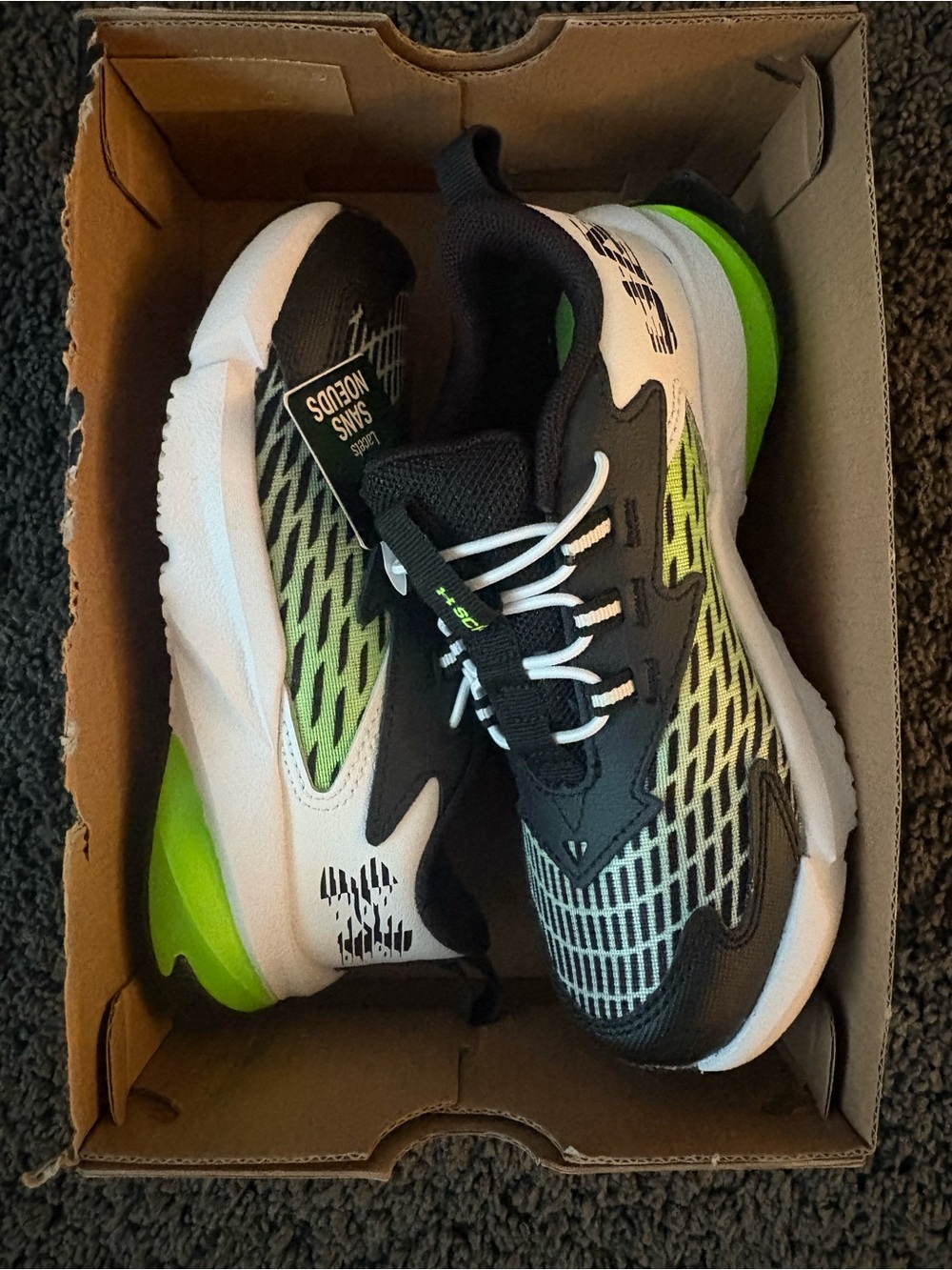 Boys size 12 Under Armour Lightweight Athletic Sneakers in Black & Neon Green